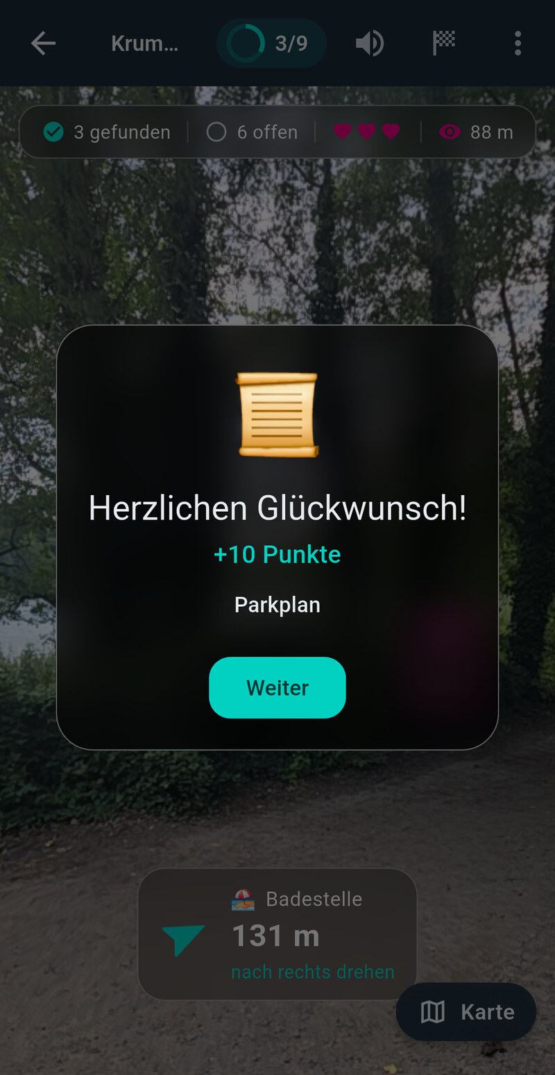 Fundmeldung mitten in der AR-Ansicht: Herzlichen Glückwunsch,
                zehn Punkte, das Ziel hieß Parkplan.
